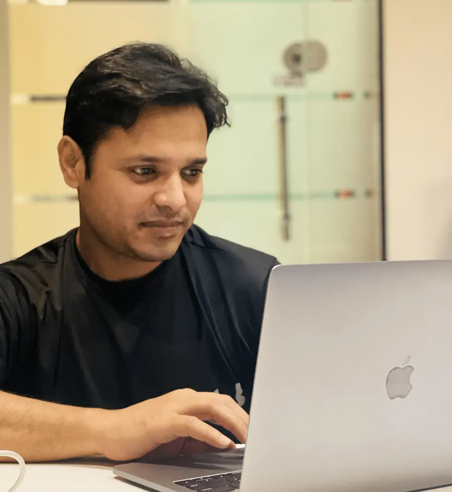 Jahanzaib Lodhi working at his laptop